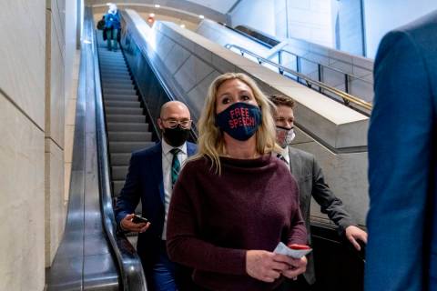 Rep. Marjorie Taylor Greene, R-Ga., goes back to her office after speaking on the floor of the ...