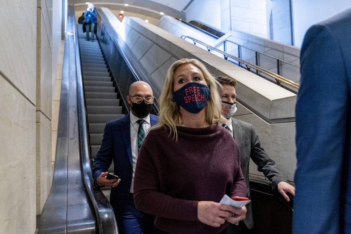 Rep. Marjorie Taylor Greene, R-Ga., goes back to her office after speaking on the floor of the ...
