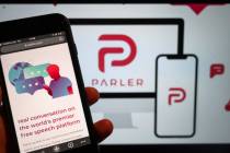 The website of the social media platform Parler is displayed in Berlin. (Christophe Gateau/dpa ...