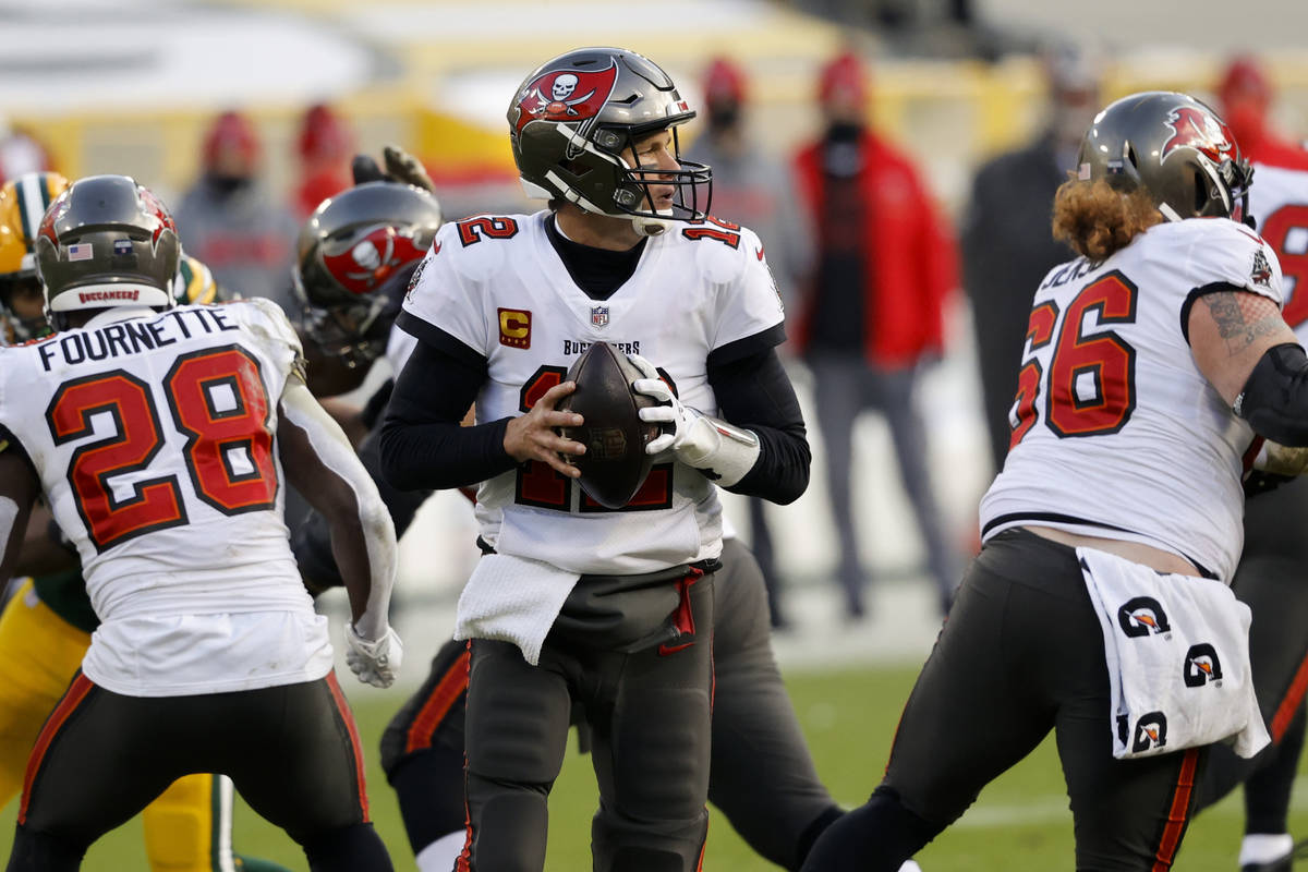 Tampa Bay Buccaneers quarterback Tom Brady (12) looks to pass against the Green Bay Packers dur ...