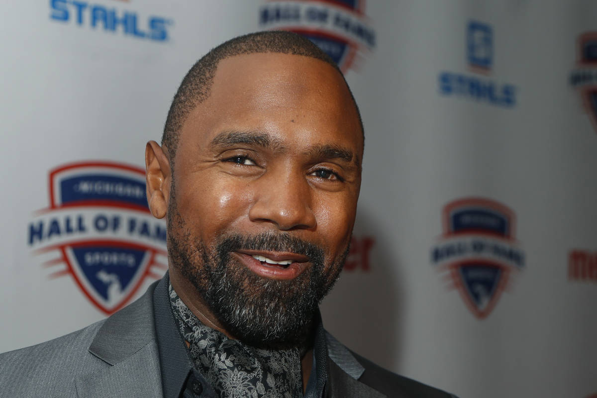 FILE - Charles Woodson is interviewed before induction ceremonies at the Michigan Sports Hall o ...