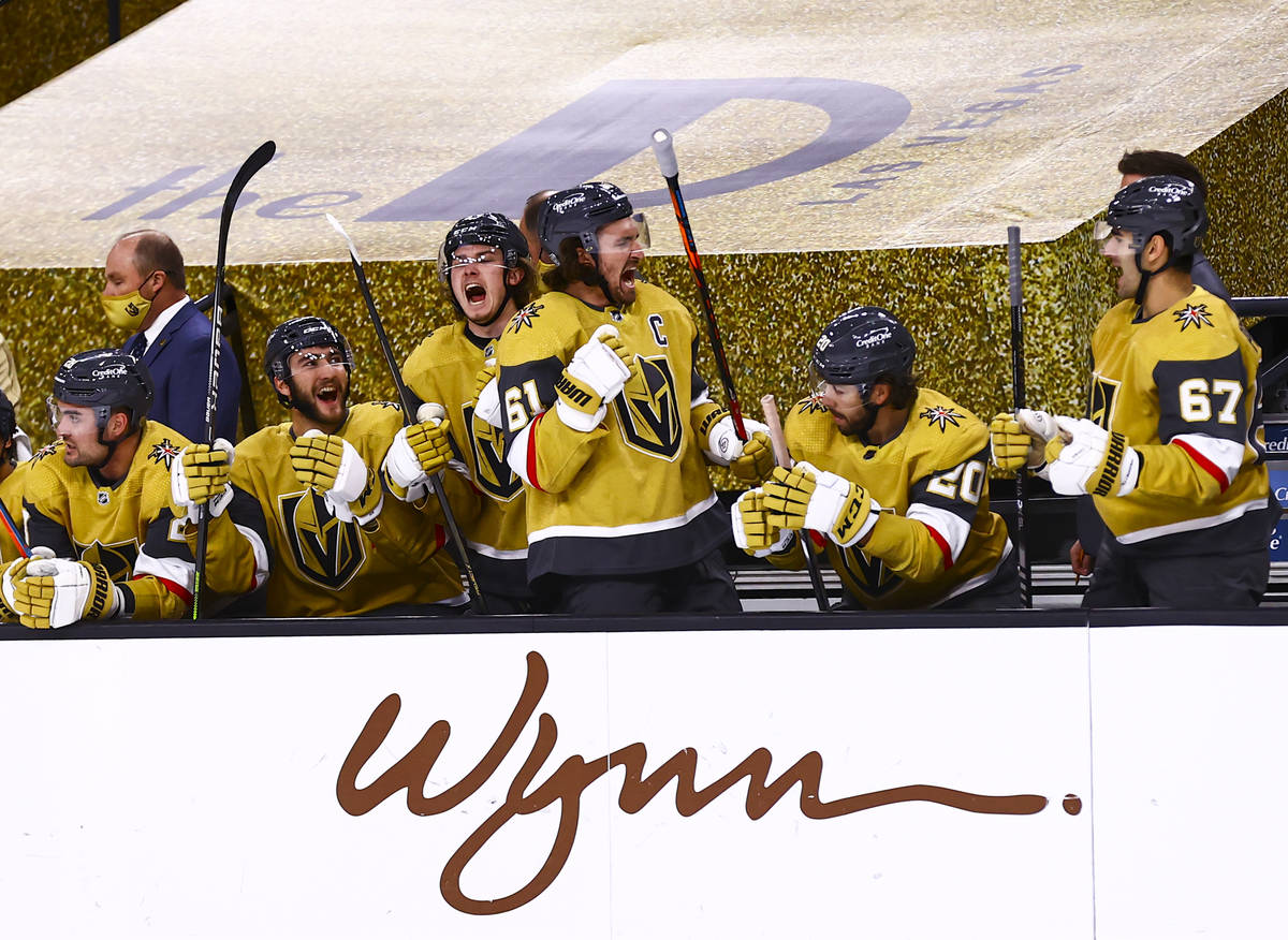 The Golden Knights celebrate a goal by right wing Reilly Smith, not pictured, during the first ...