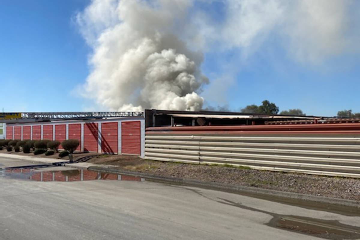 Crews battle a fire Sunday, Feb. 7, 2021, at a storage facility located on 2525 N. Lamont St. i ...