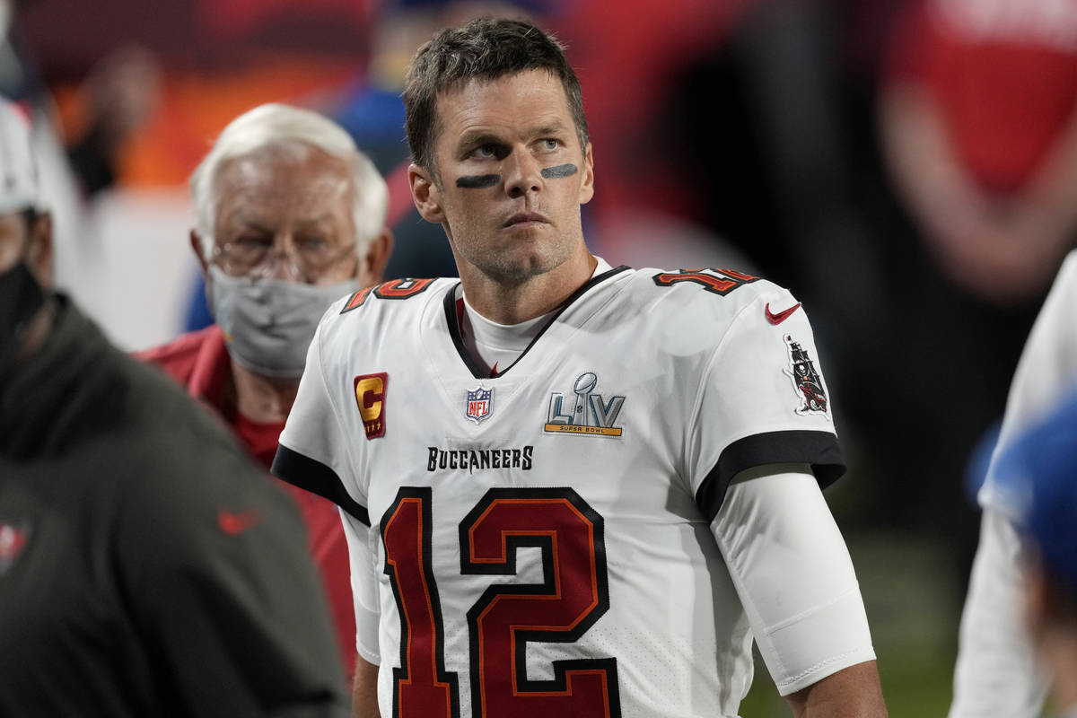 Tampa Bay Buccaneers quarterback Tom Brady walks off the field at halftime of the NFL Super Bow ...