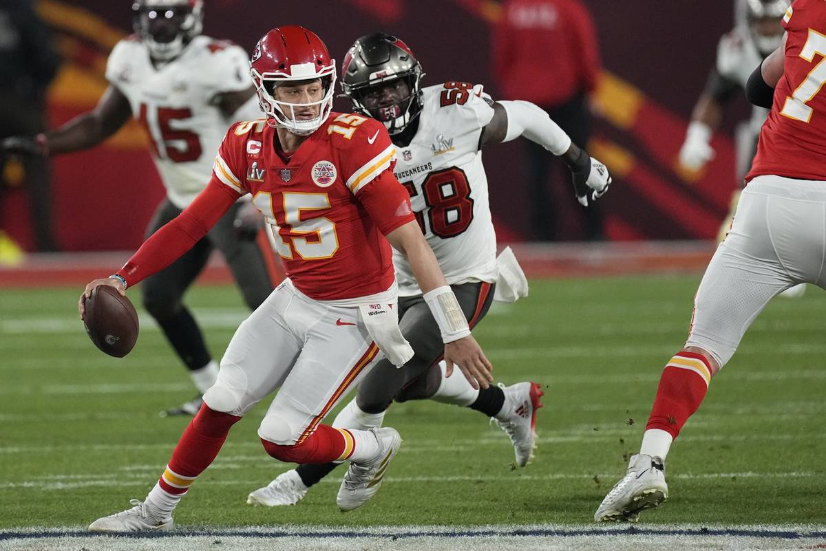 Kansas City Chiefs quarterback Patrick Mahomes looks to throw against the Tampa Bay Buccaneers ...
