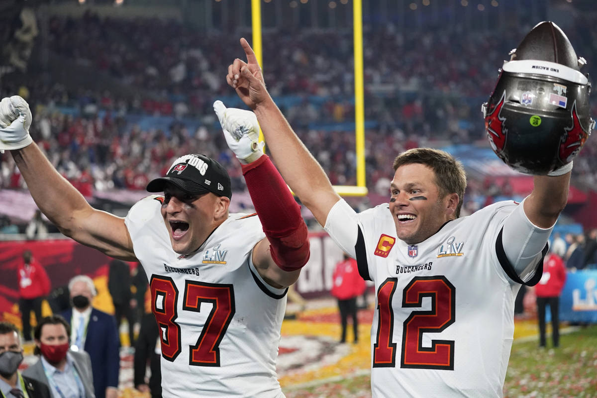 Tampa Bay Buccaneers tight end Rob Gronkowski, left, and quarterback Tom Brady celebrate after ...