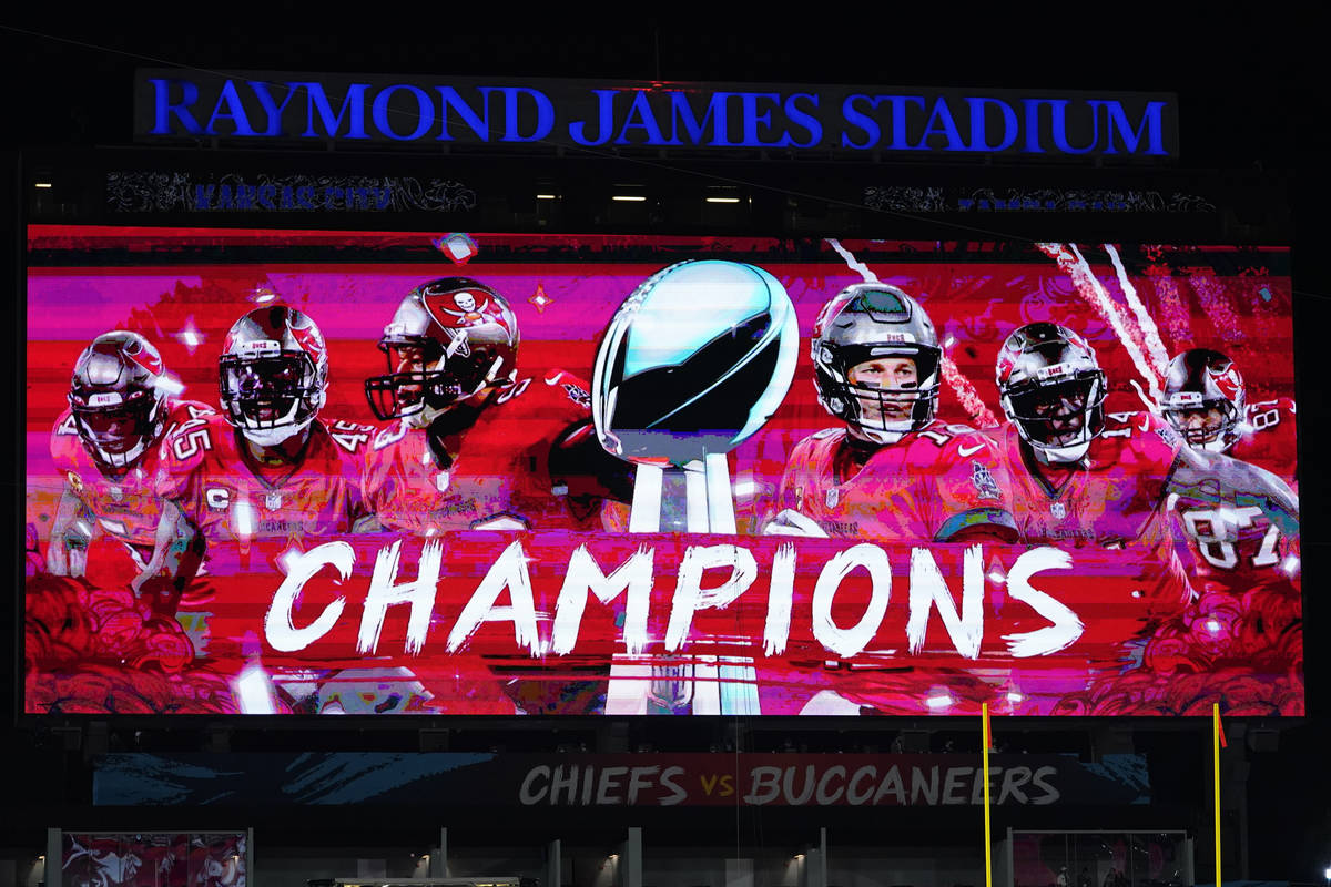 Signage is lit up after of the NFL Super Bowl 55 football game against the Kansas City Chiefs, ...