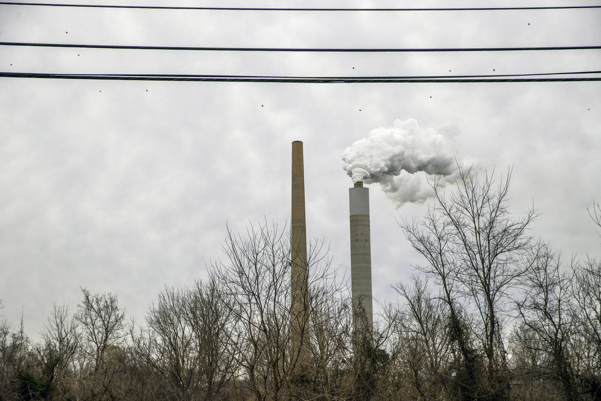 Steam rises from one of several coal fire plants on Thursday, Feb. 4, 2021, in Point Pleasant, ...