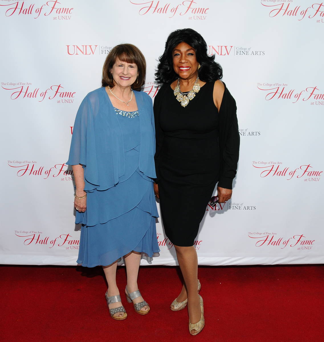 UNLV College of Fine Arts Dean Nancy Uscher is shown with Nancy Wilson on the red carpet of the ...
