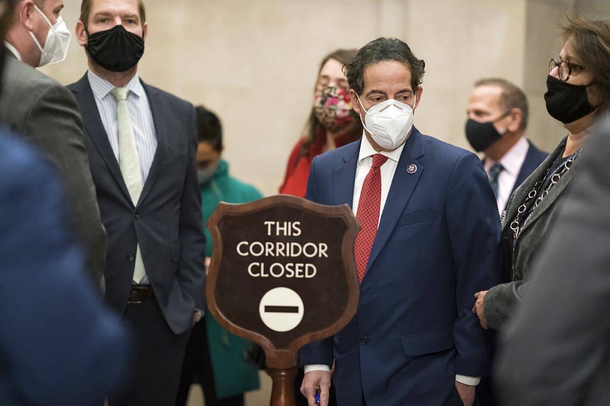 Rep. Jamie Raskin, D-Md., right, the lead House impeachment manager, is joined by Rep. Eric Swa ...