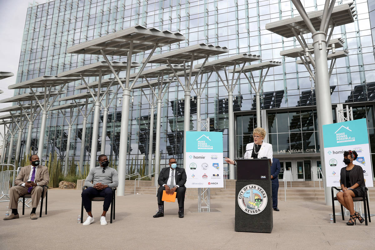Mayor Carolyn Goodman, second from right, speaks during a press conference to announce the form ...