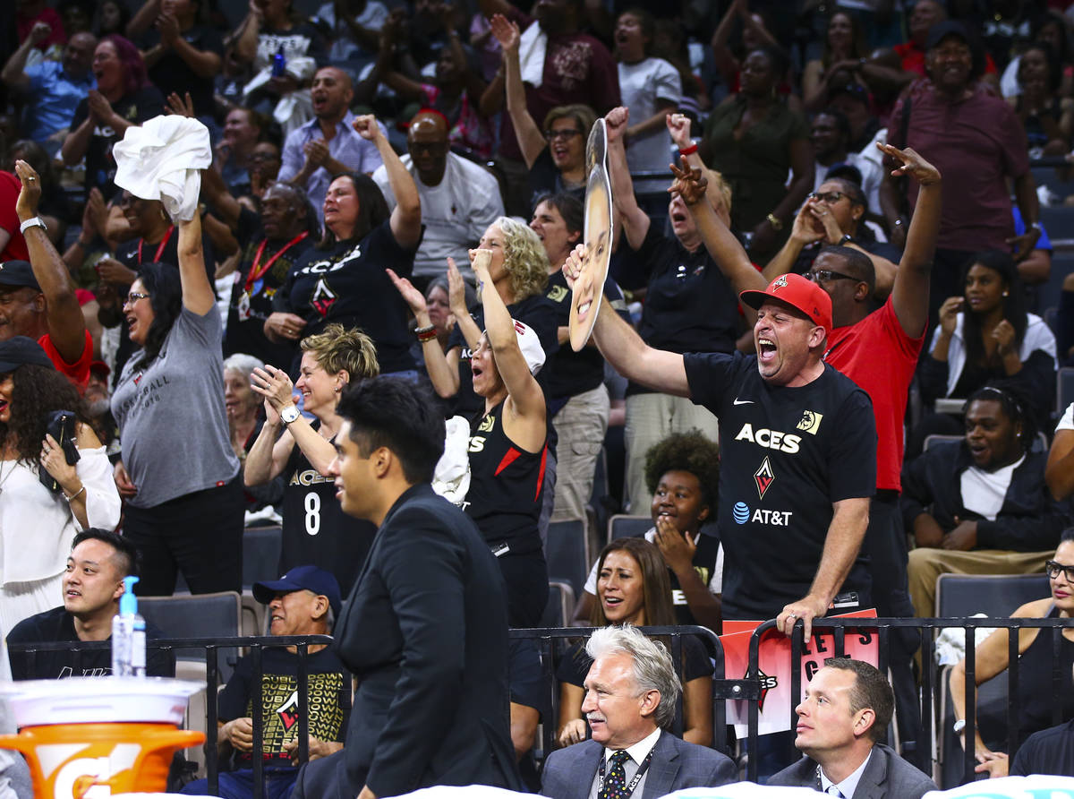 Las Vegas Aces fans cheer during the second half of a WNBA basketball game against the Los Ange ...