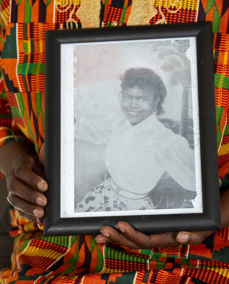 Yvonne Wesley, daughter of Black activist Mary Wesley, holds her mother's photo at her home on ...