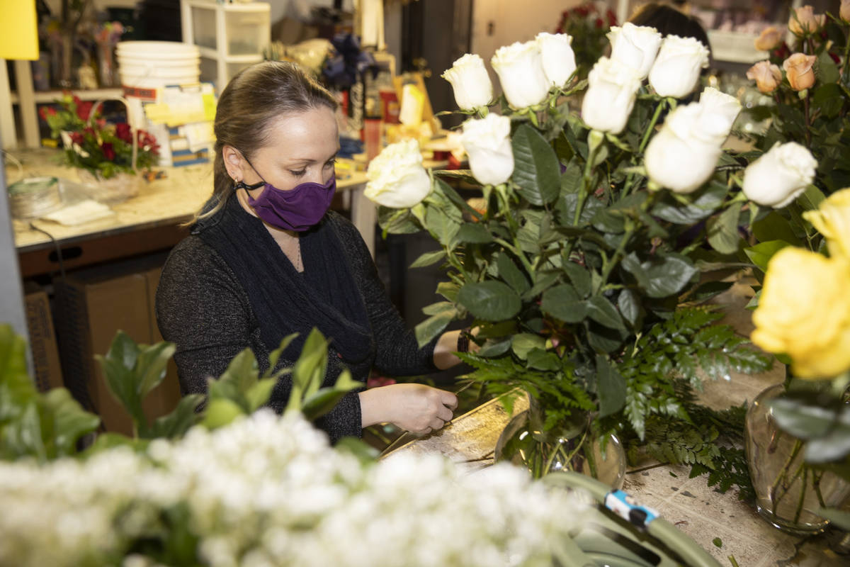 Amy Gardiner, daughter of the owners of DiBella Flowers & Gifts, John Dibella and wife Susa ...