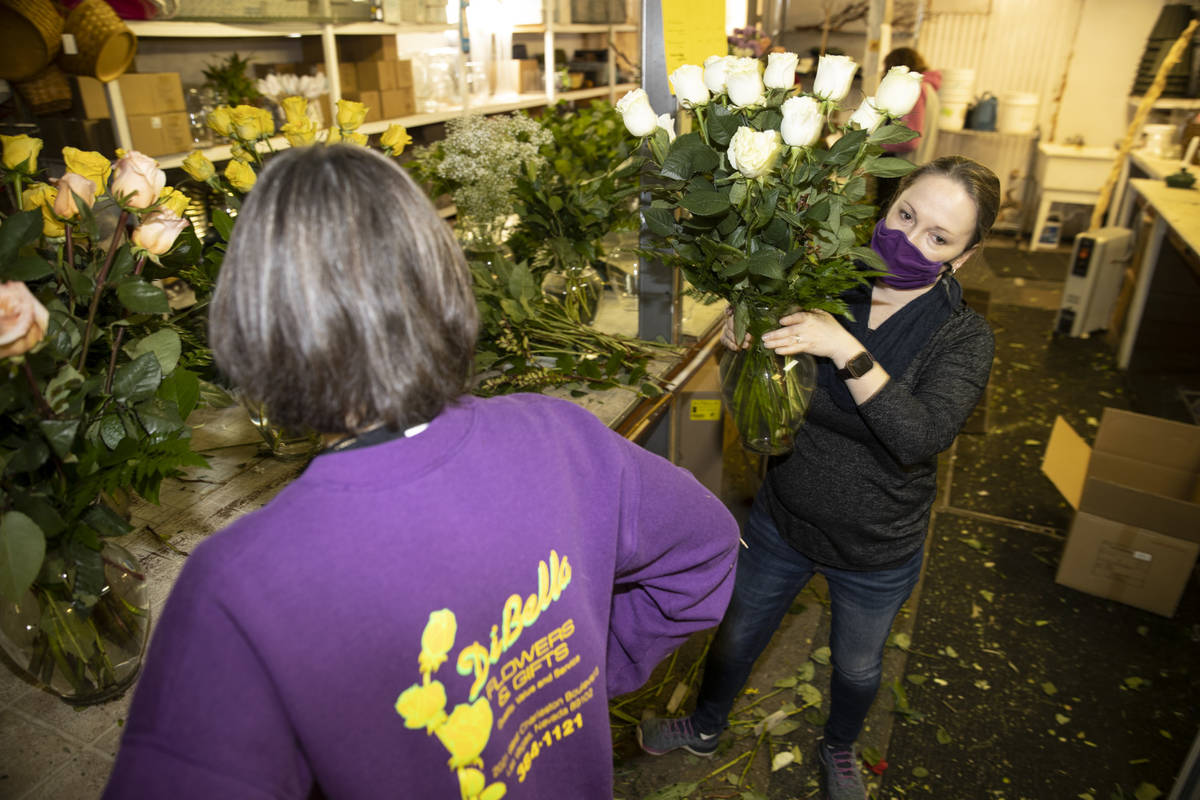 Amy Gardiner, right, with her mother Susan DiBella, co-owner of DiBella Flowers & Gifts, as ...