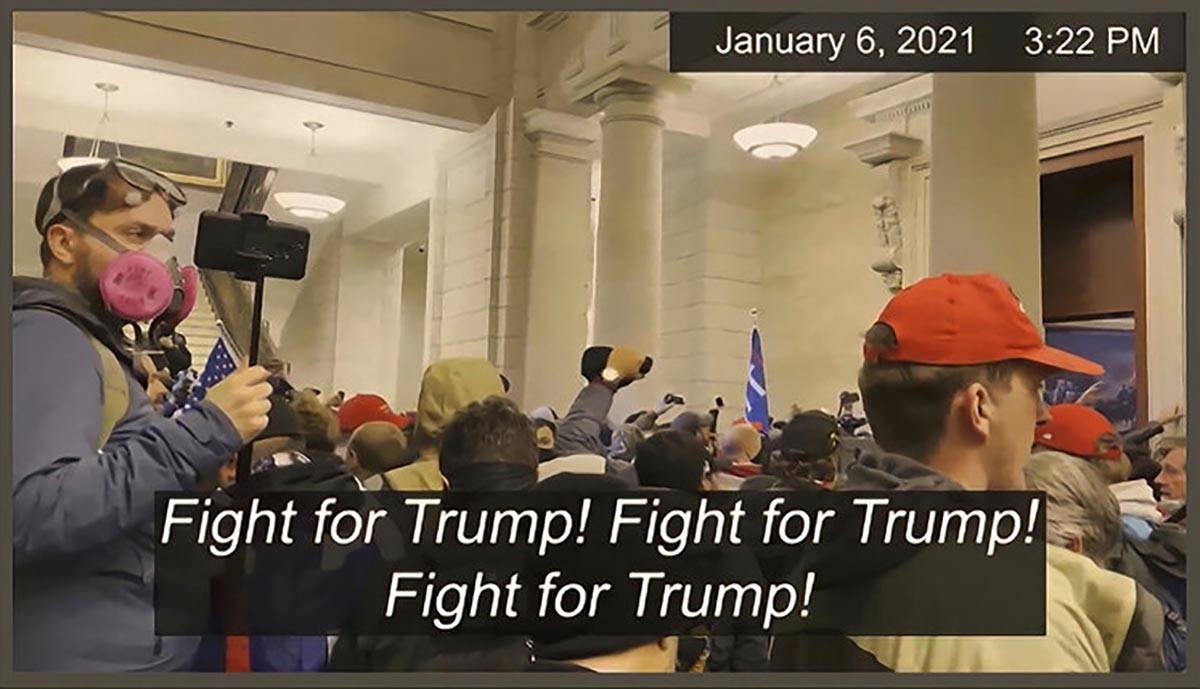 This image from video shows one of many slides presented by Democrats prosecuting the impeachme ...