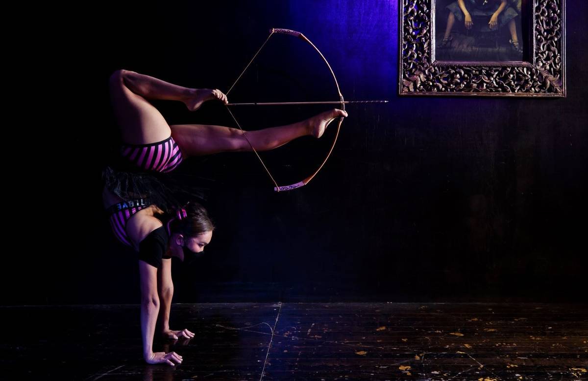 Contortionist Tsatsral Erdenebileg rehearses with a bow and arrow for the Apero show on the Bao ...