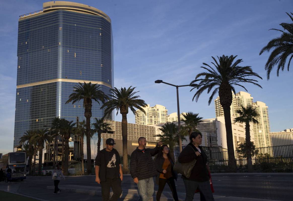 People walk past the Drew Las Vegas, formerly the Fontainebleau, on the Strip in 2017. (Las Veg ...
