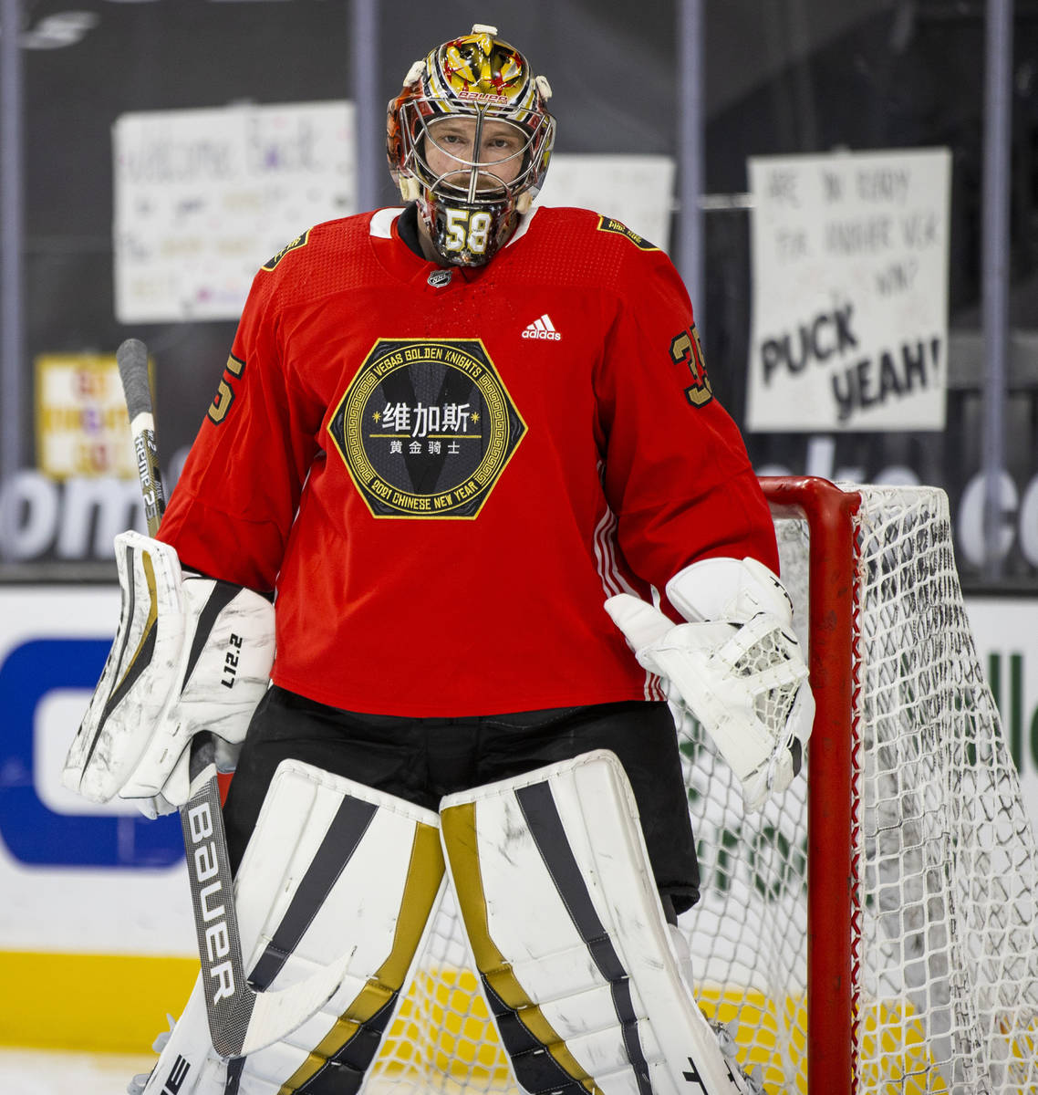 Golden Knights goaltender Oscar Dansk (35) looks on during warm ups before the first period of ...
