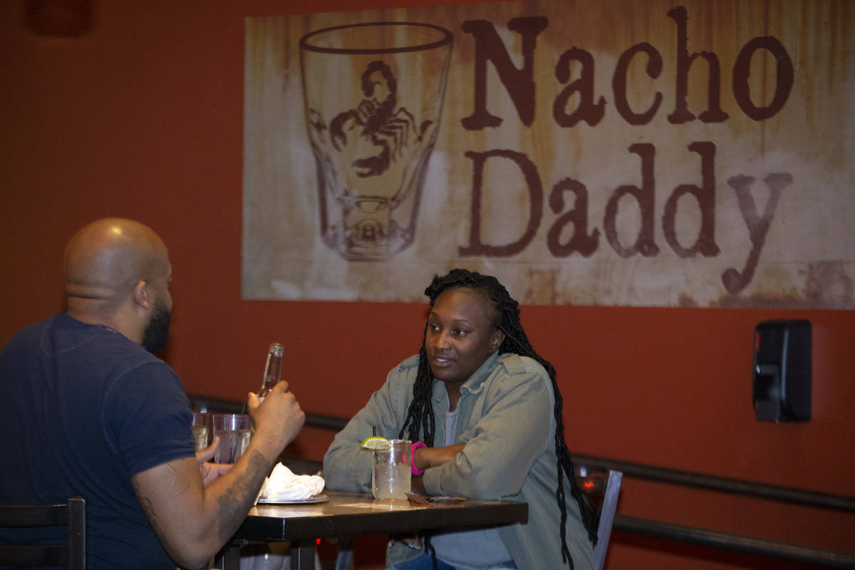 Las Vegas local Seqoiya Burress eats dinner with her husband Louis Burress at Nacho Daddy on Fe ...