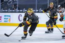 Golden Knights center William Karlsson (71) moves the puck up the ice with Anaheim Ducks defens ...