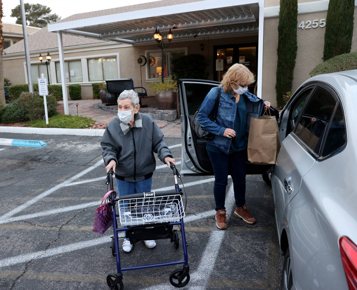 Estelle Roberts, 92, left, and her daughter Dori Roberts-Lombardi, 65, at her Las Vegas assiste ...