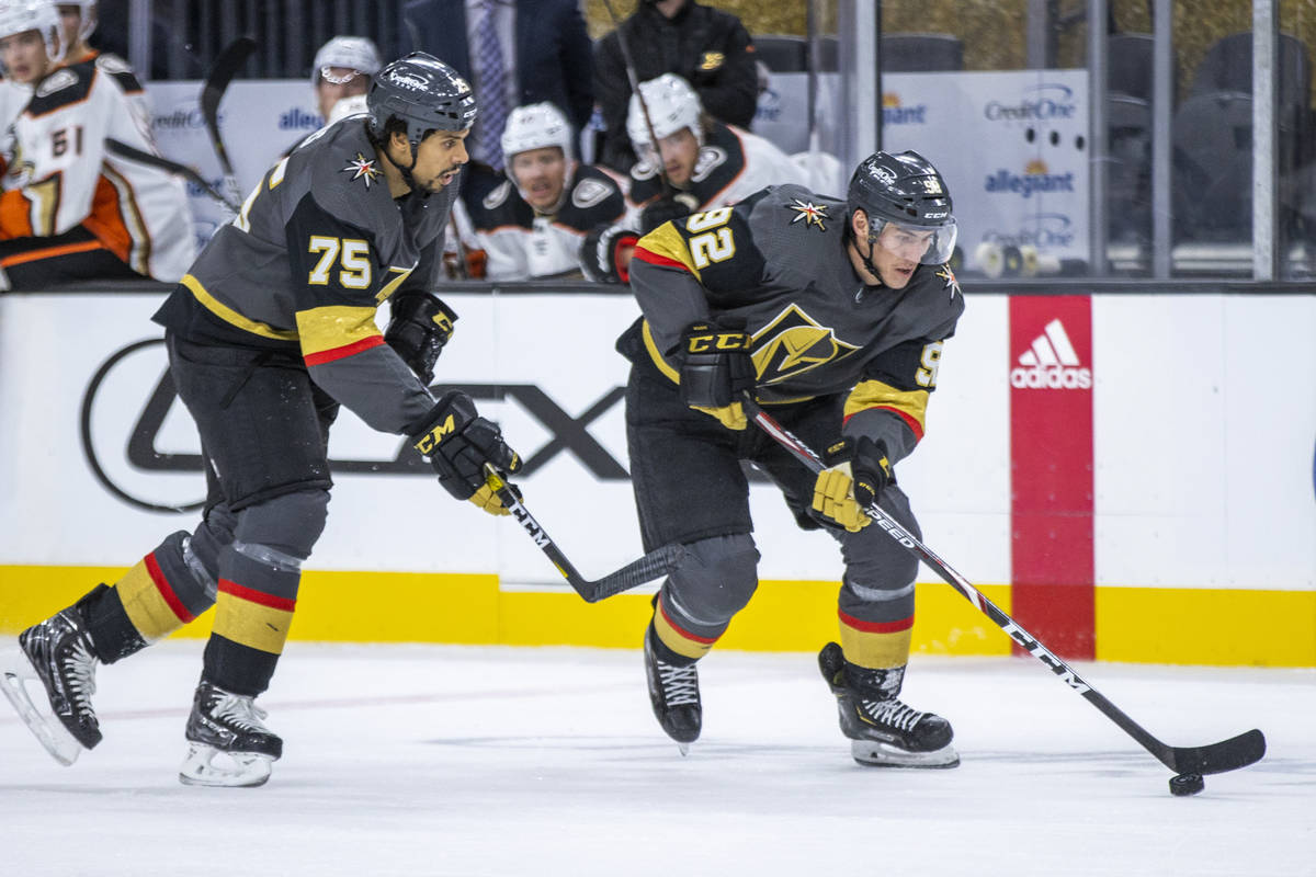 Golden Knights right wing Tomas Jurco (92) drives to the net with teammate Golden Knights right ...