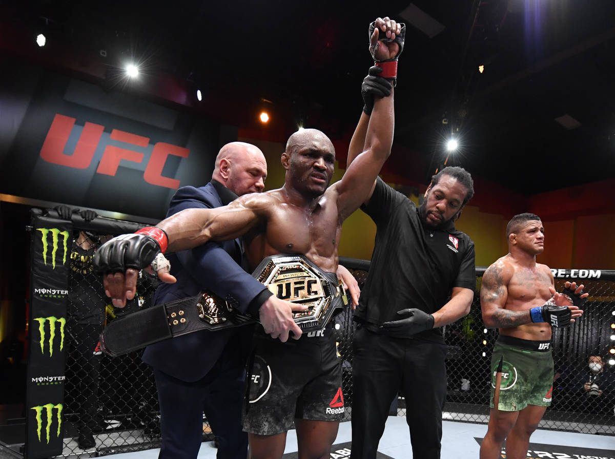Kamaru Usman of Nigeria reacts after his victory over Gilbert Burns of Brazil in their UFC welt ...
