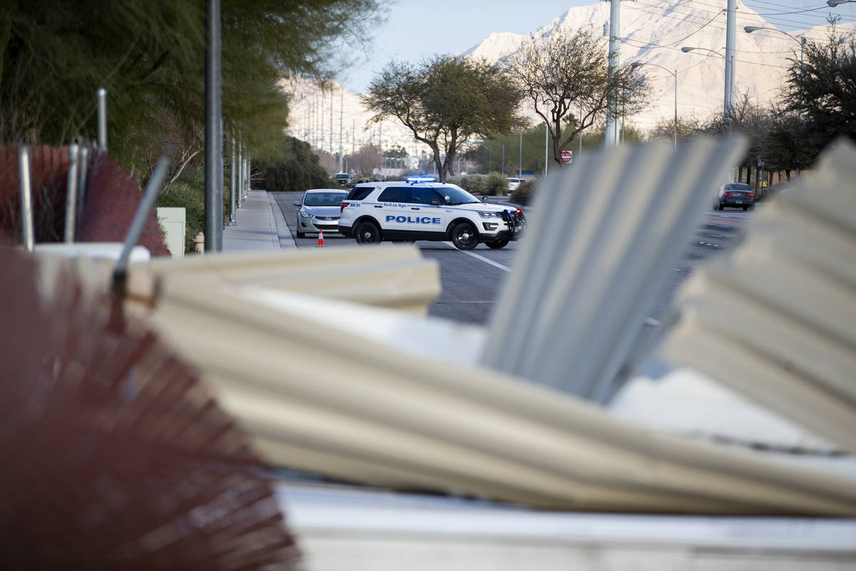 North Las Vegas police divert vehicles on W Carey Avenue after a movie screen from the West Win ...