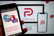 The website of the social media platform Parler is displayed in Berlin. (Christophe Gateau/dpa ...