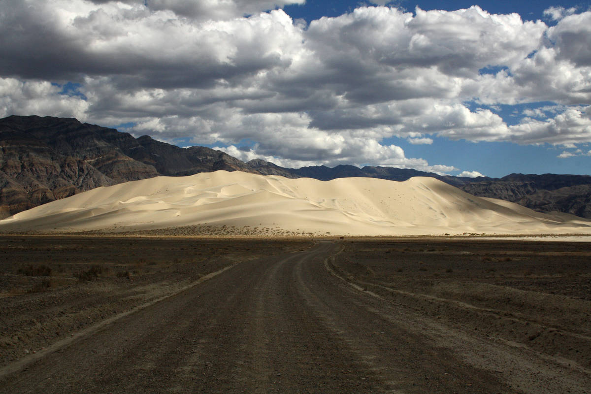 Eureka Dunes appear surreal against the backdrop of the Last Chance Mountains in Death Valley N ...