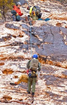 Metropolitan Police Department search and rescue lowers a climber to an extraction point after ...