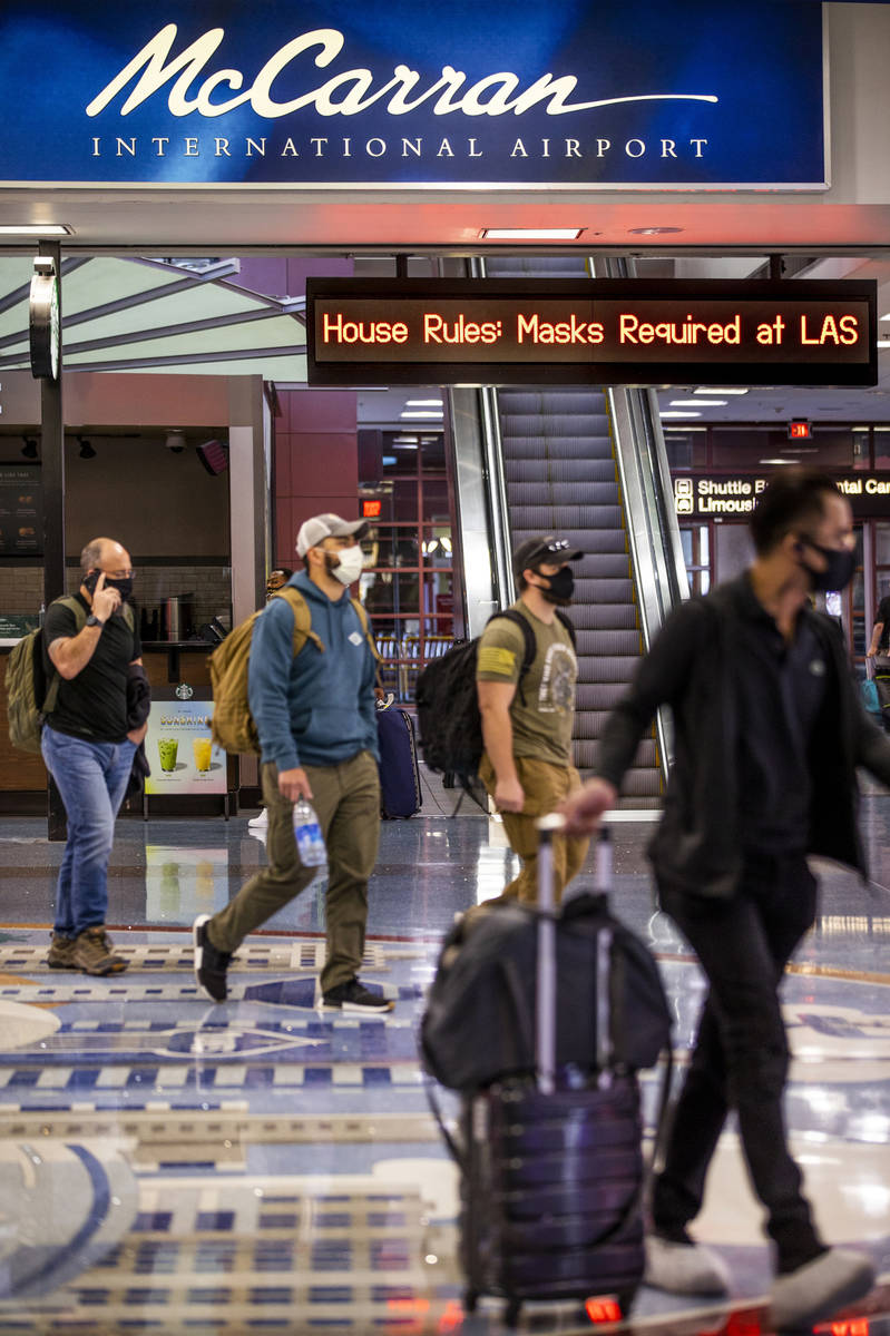 Visitors at the Terminal 1 baggage area at McCarran International Airport which the Clark Count ...