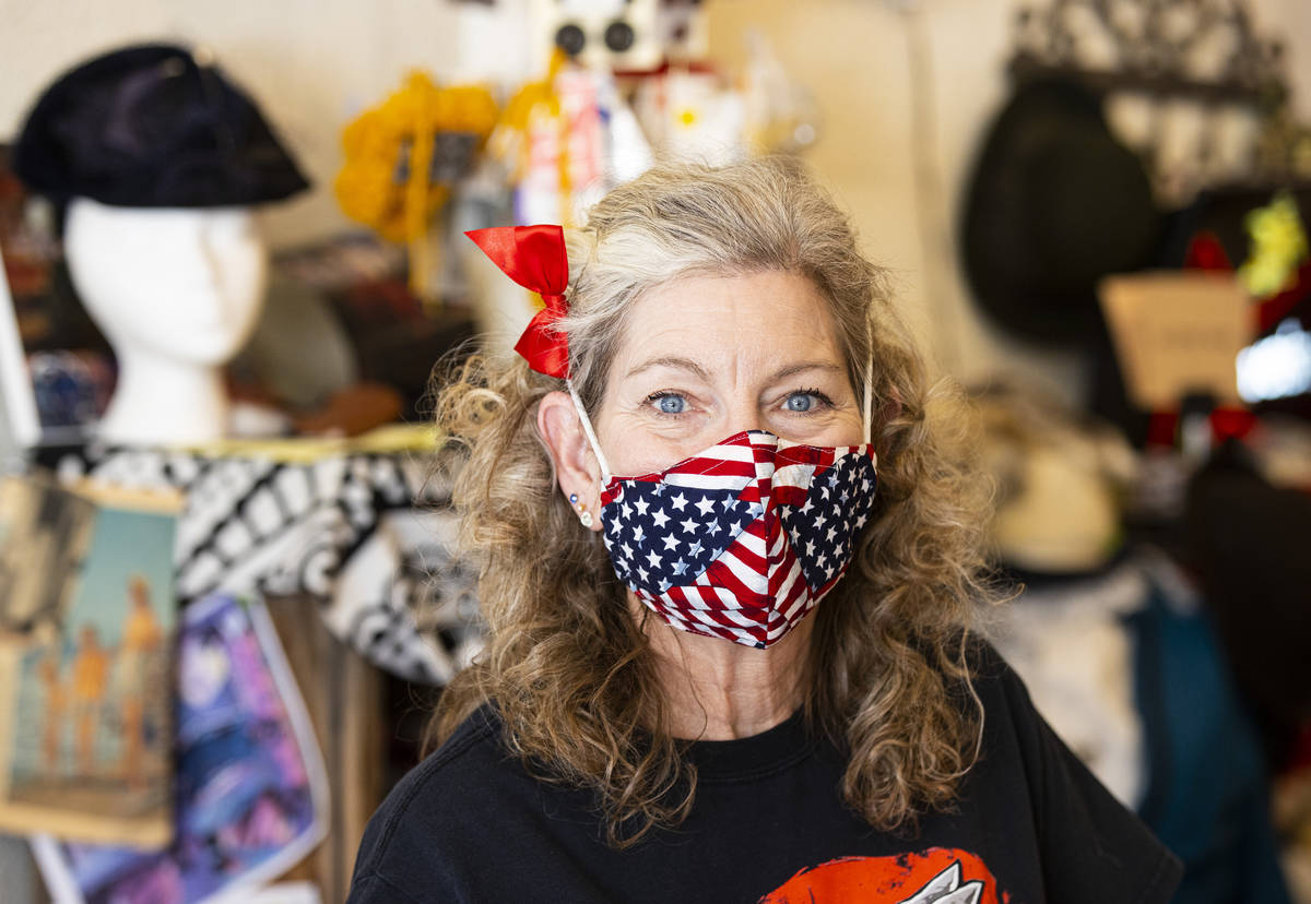 Becky Miller, owner of Main Street Mercantile, poses for a portrait at her shop in the Arts Dis ...