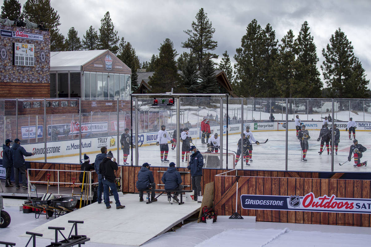 Vegas Golden Knights practice on an outdoor rink built over the 18th fairway of a golf course i ...