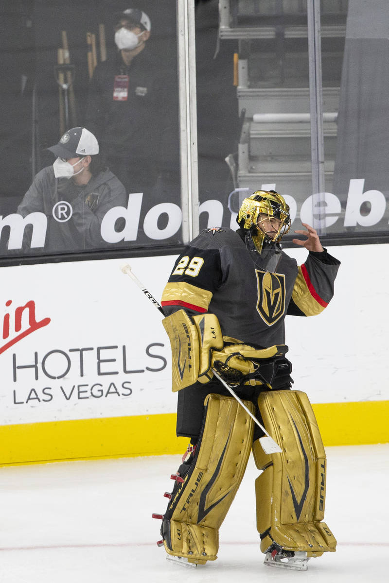 Golden Knights goaltender Marc-Andre Fleury (29) reacts after letting the Colorado Avalanche sc ...