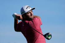 Jon Rahm, of Spain, hits from the second tee on the South Course during the final round of the ...