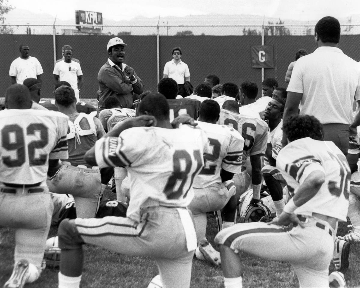 UNLV coach Wayne Nunnely addresses his team at Rebel Park. Photo courtesy of UNLV athletics.