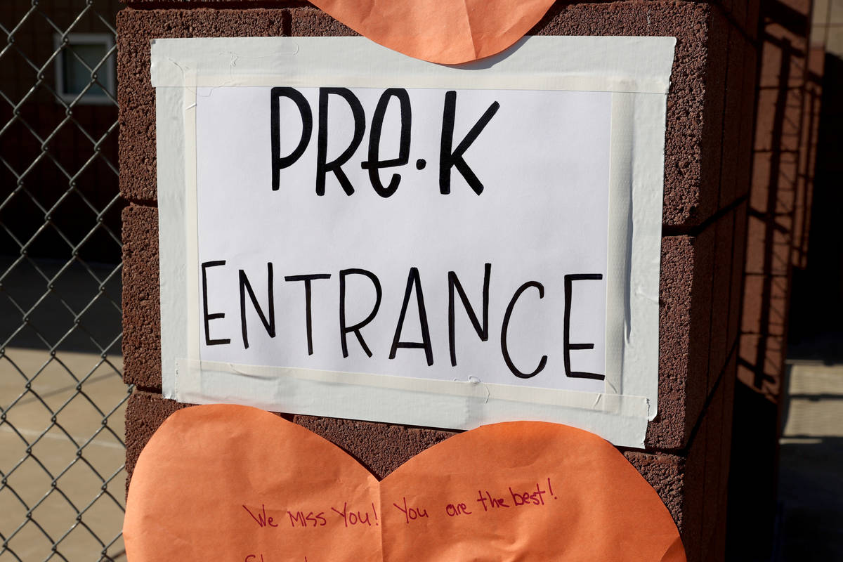 An instructional sign during a school supply distribution event at McCaw STEAM Academy in Hende ...