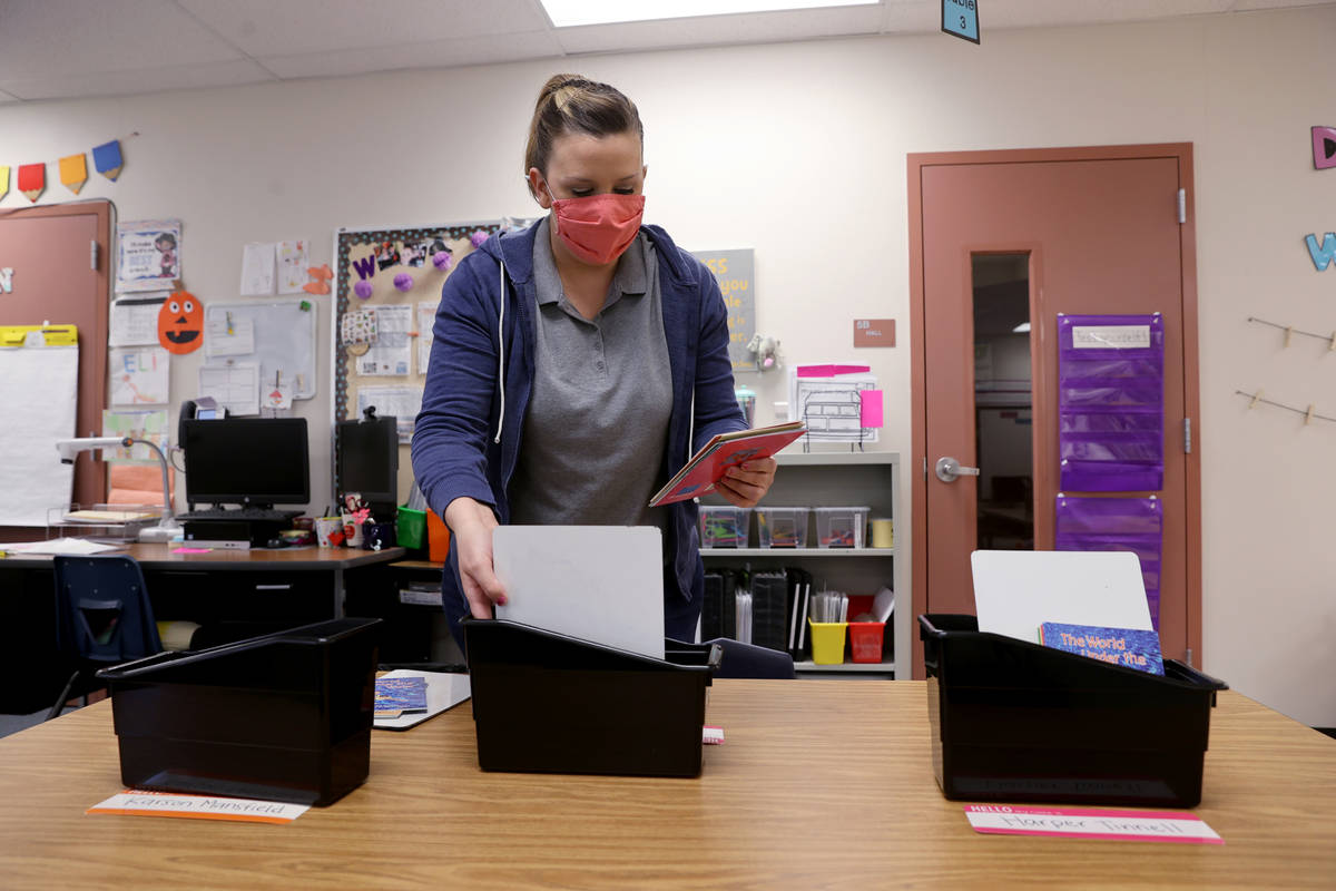 Kindergarten teacher Molly Wood prepares her classroom at McCaw STEAM Academy in Henderson Wedn ...