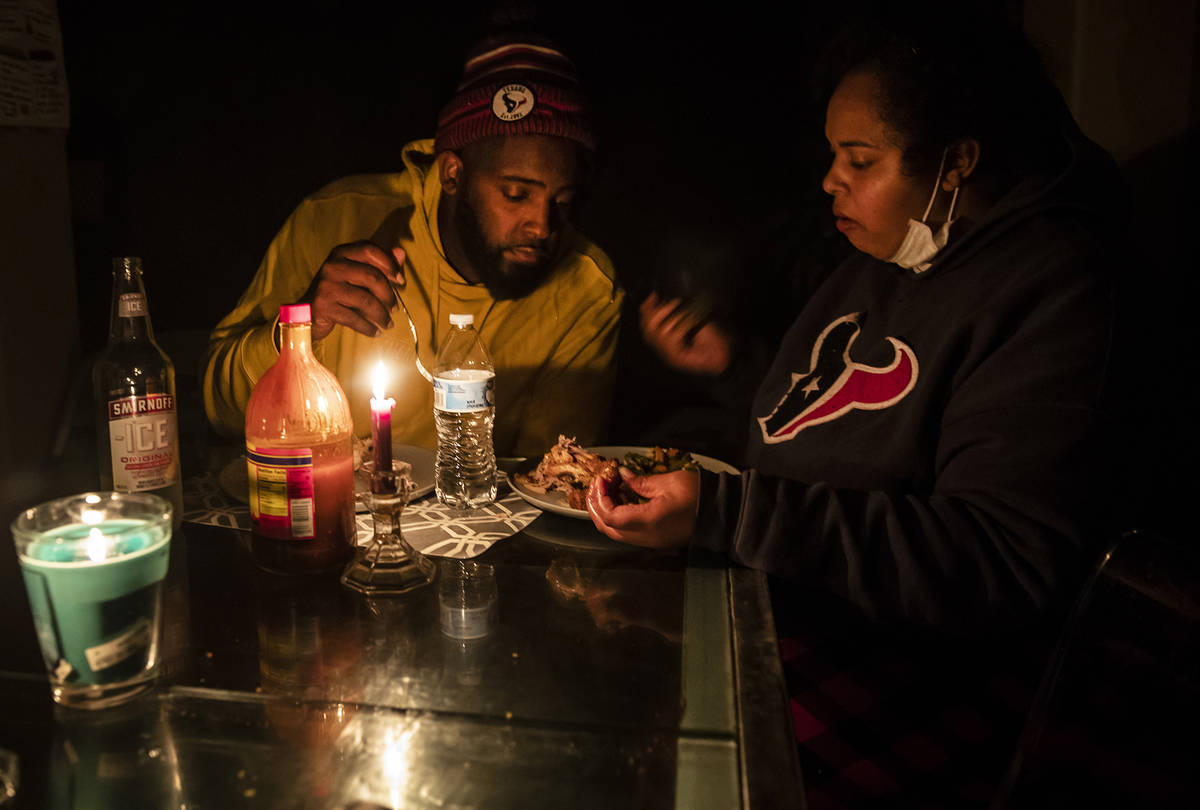 Howard and Nena Mamu eat dinner at their home in the Glenwood neighborhood in Hutto, Texas, Tue ...