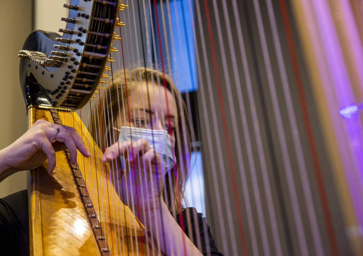 Harpist Melaney Jones plays for an Ash Wednesday service at Faith Community Lutheran Church on ...