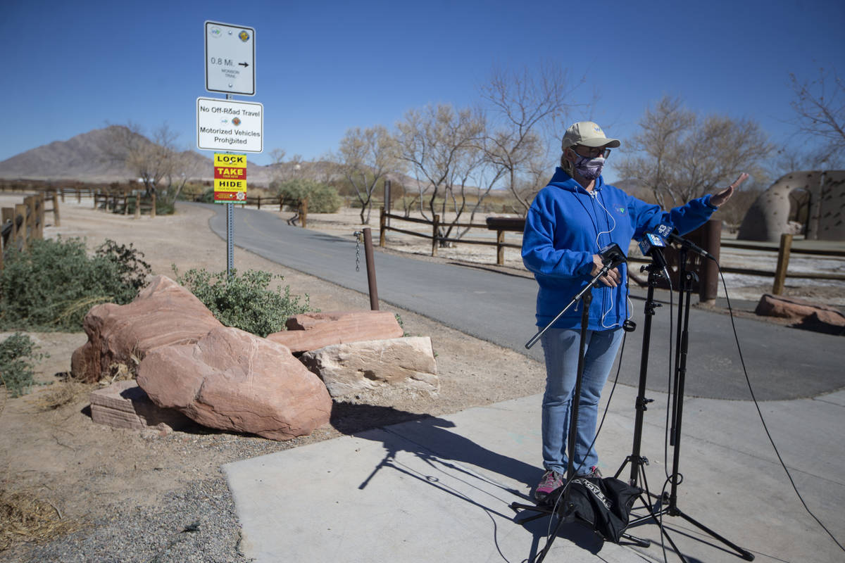 Liz Bickmore, programs manager for Clark County Wetlands Park, talks about the fire that burned ...