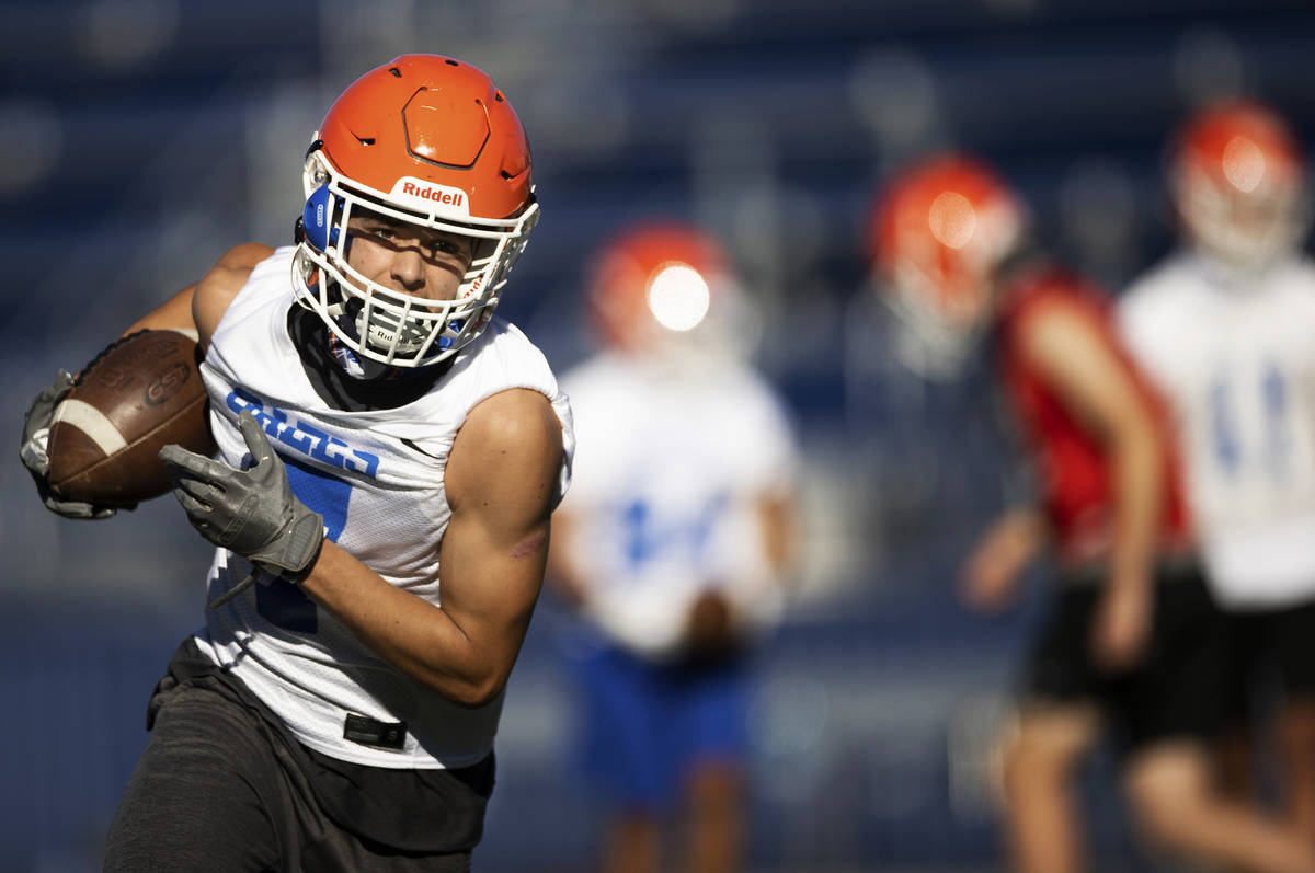 Bishop Gorman's Dylan Herman (7) works through receiving drills during practice on Friday, Feb. ...