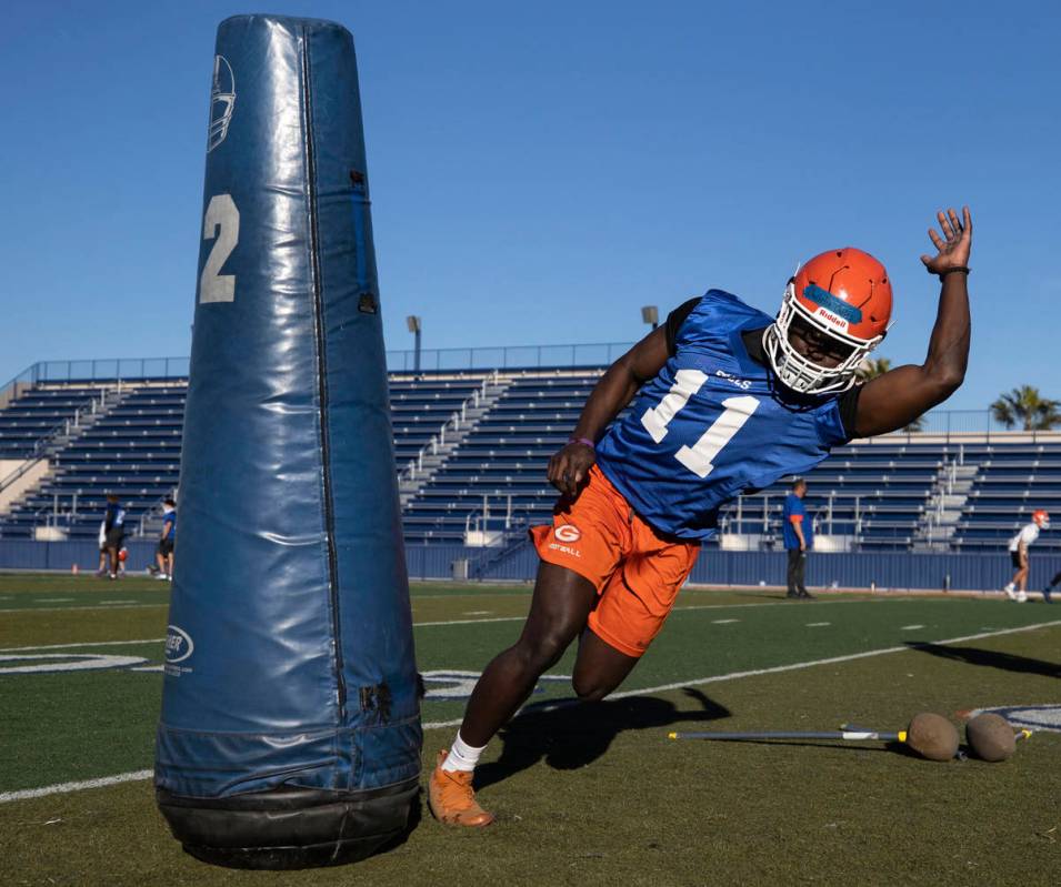 Bishop Gorman's Charlotin Charles (11) works through defensive drills during practice on Friday ...
