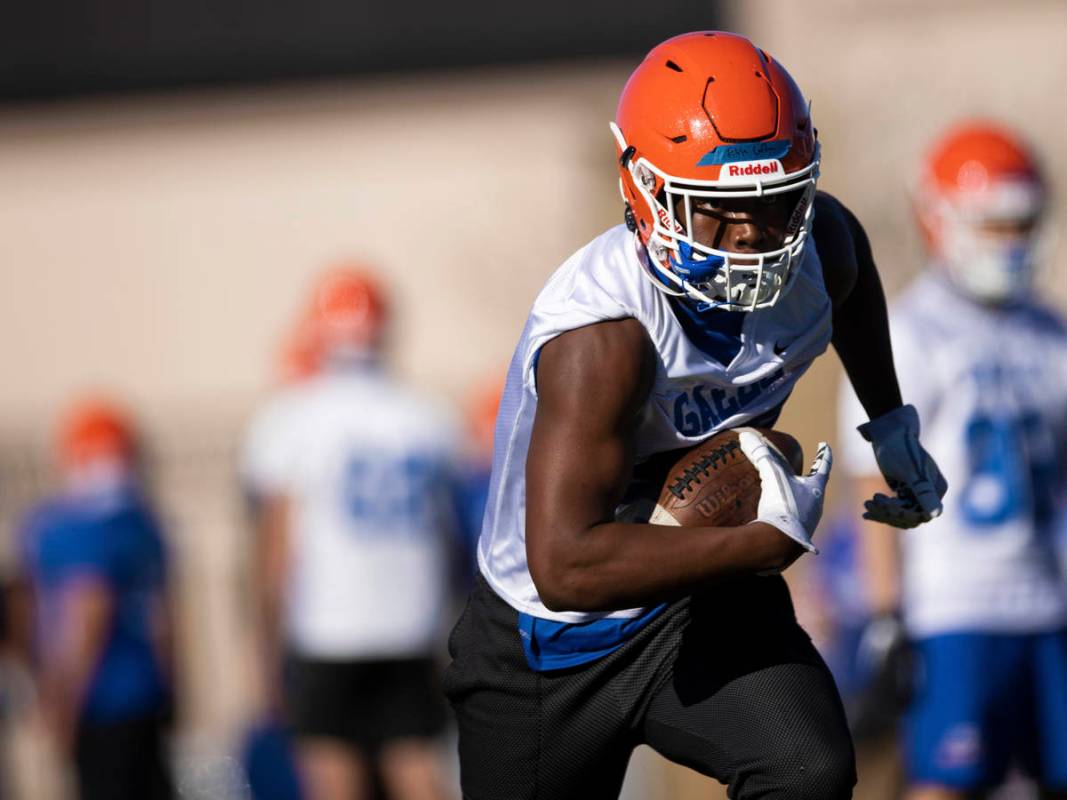 Bishop Gorman's Elija Lofton (28) works through receiving drills during practice on Friday, Feb ...