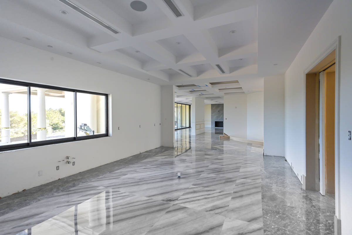 The main floor has a secondary master bedroom, office, living room, family room, formal dining ...