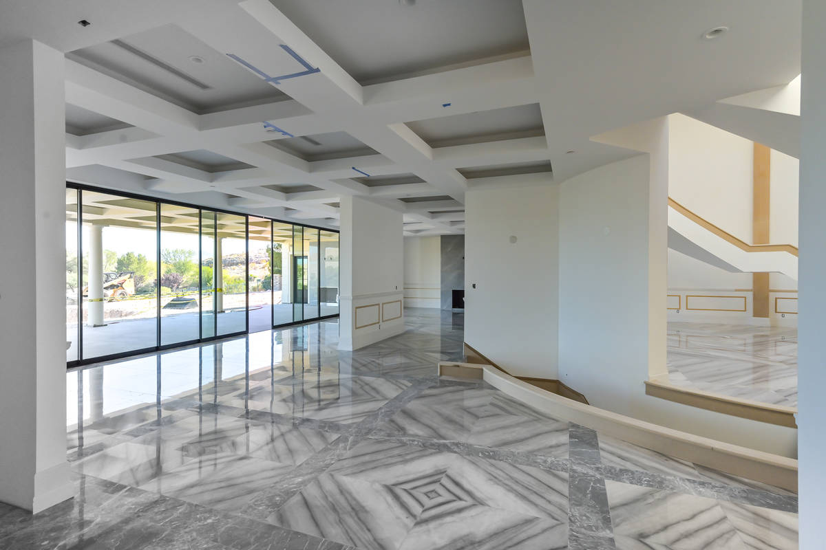 The home has an open floor plan. (Luxurious Real Estate)