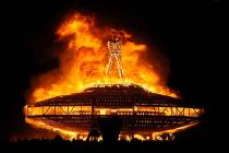 In this Aug. 31, 2013, file photo, the "Man" burns on the Black Rock Desert at Burning Man near ...