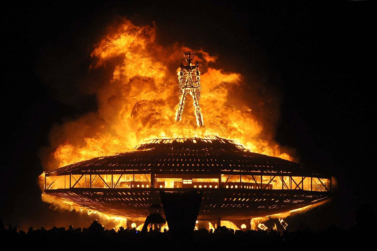 In this Aug. 31, 2013, file photo, the "Man" burns on the Black Rock Desert at Burning Man near ...
